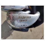 Assorted youth golf clubs and bag