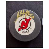 Martin Brodeur signed hockey puck certified