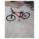 Red Schwinn ranger 21 speed bike