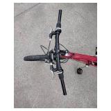 Red Schwinn ranger 21 speed bike