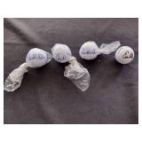 4 unknown uncertified signed golf balls