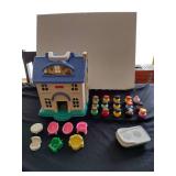 Vintage little people house with figures