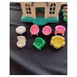 Vintage little people house with figures