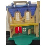 Vintage little people house with figures