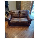 Brown leather couches with ottoman