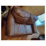 Brown leather couches with ottoman