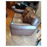 Brown leather couches with ottoman
