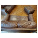 Brown leather couches with ottoman