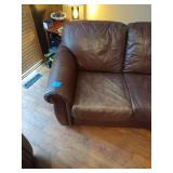 Brown leather couches with ottoman