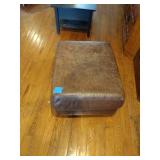 Brown leather couches with ottoman