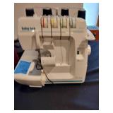 Baby lock protégé sowing machine with 26 rolls of thread