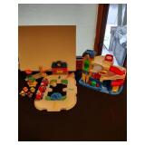 Little people train station and parking garage with train and figures