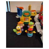 Little people train station and parking garage with train and figures