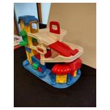 Little people train station and parking garage with train and figures