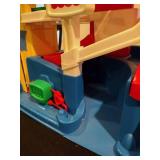 Little people train station and parking garage with train and figures