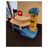 Little people train station and parking garage with train and figures