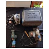 Power tools, SKILSAW, Black and Decker Sawzaw, and hand saws.