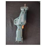 Power tools, SKILSAW, Black and Decker Sawzaw, and hand saws.