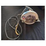 Power tools, SKILSAW, Black and Decker Sawzaw, and hand saws.