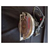 Power tools, SKILSAW, Black and Decker Sawzaw, and hand saws.