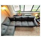 Gray sectional couch with ottoman