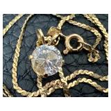 14k Gold Chain Paired with a Sparkly Cubic Zirconia Pendant