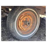 Used Flatbed Trailer Frame with Wooden Dump Deck that is 8