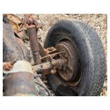 Rusty Chassis Frame with Steering Wheel and Automotive Components - Volkswagen