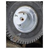 Huge Pile of a variety of Lawn Mower Tires