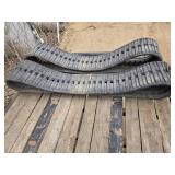 Pair of Used Skid Loader Rubber Tracks - 1 is Damaged