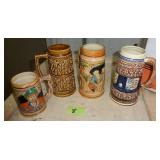 FOUR beer steins