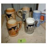 FIVE beer steins