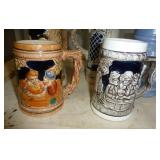 FIVE beer steins