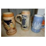 FIVE beer steins