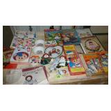 Large lot of Raggedy Ann books, dolls, mini tea set, dishes