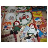 Large lot of Raggedy Ann books, dolls, mini tea set, dishes