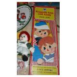 Large lot of Raggedy Ann books, dolls, mini tea set, dishes