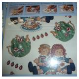 Lot of Raggedy Ann transfers, socks, books, toys, vintage salt and pepper