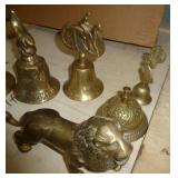 Group of brass bells and lions