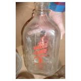 Box of vintage milk bottles