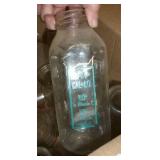 Box of vintage milk bottles