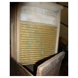 3 washboards and an old crate