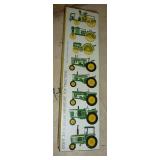 Collection of 8 mini John Deere tractors new in box