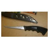 Two filet knives and 10 fishing towels