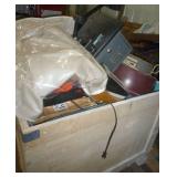 Crate full of items either not sold or not picked up