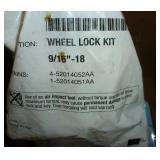 lug nuts, drill bits, small socket set