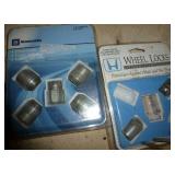 lug nuts, drill bits, small socket set