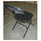 Stack of 40 folding chairs