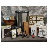 Assorted Home Goods Including Trash Bin, Shower Curtain, and Picnic Set