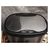 Assorted Home Goods Including Trash Bin, Shower Curtain, and Picnic Set